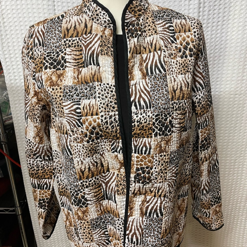Alfred Dunner size 10 pattern I’d animal print beige, cream , black